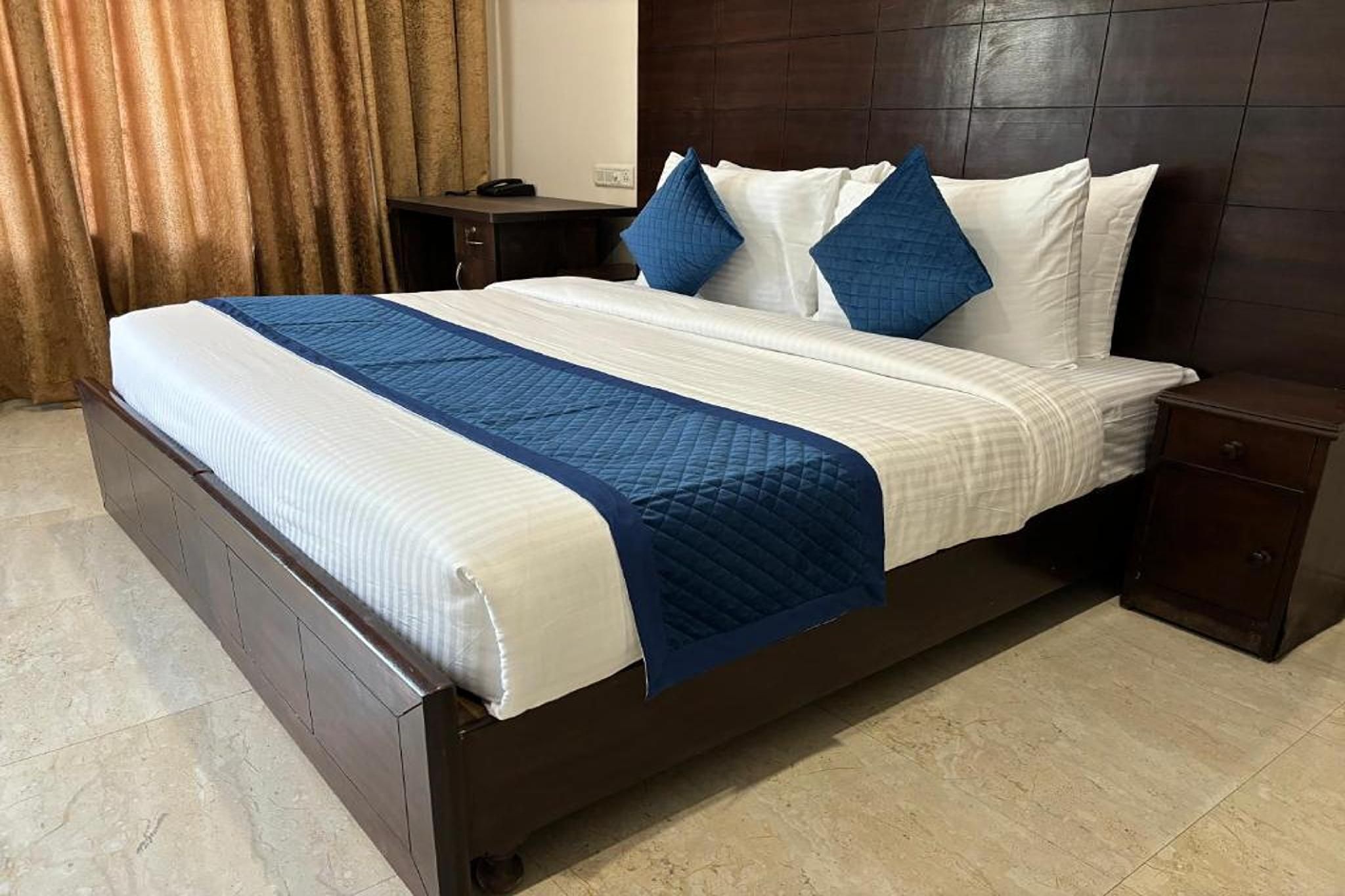 Atulya Green By Meyatri Deluxe Room 2