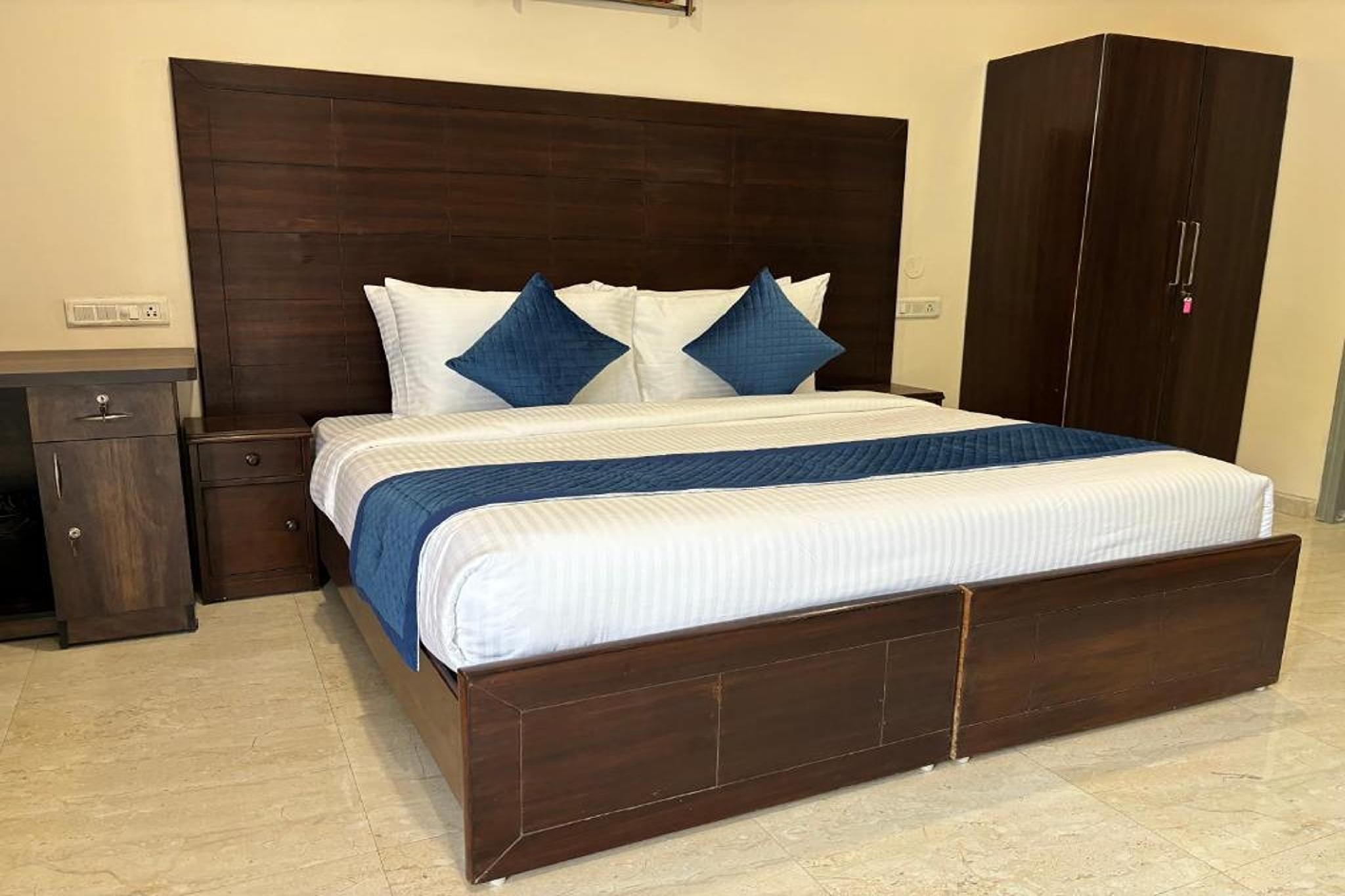 Atulya Green By Meyatri Deluxe Room