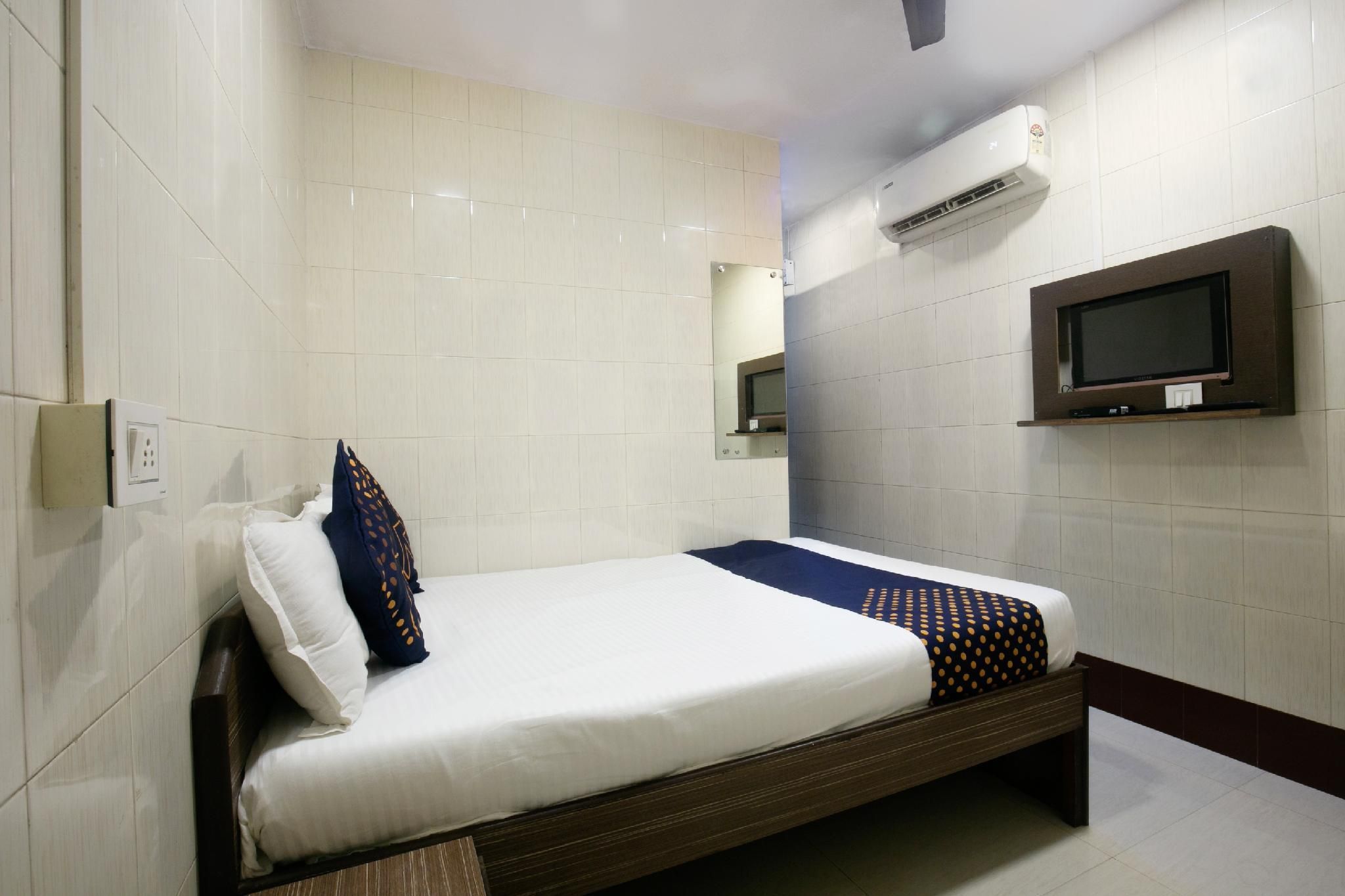 SPOT ON Hotel Saim Palace Near Marine Drive Beach