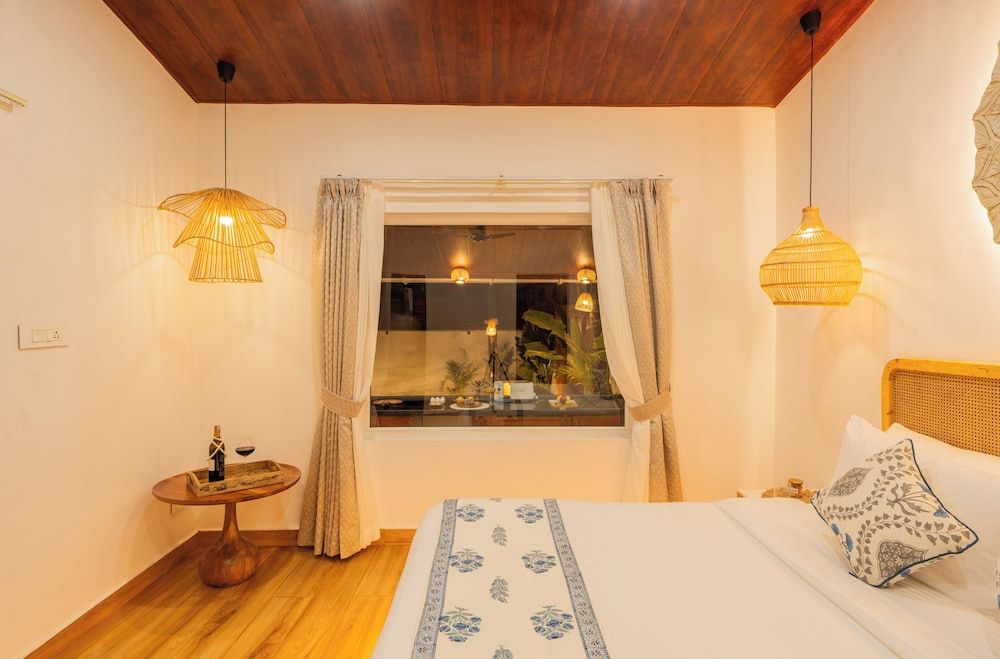 ELIVAAS House of Neptune 1 BHK Boutique Cottage, 1 King Bed, Patio, Sea View 5