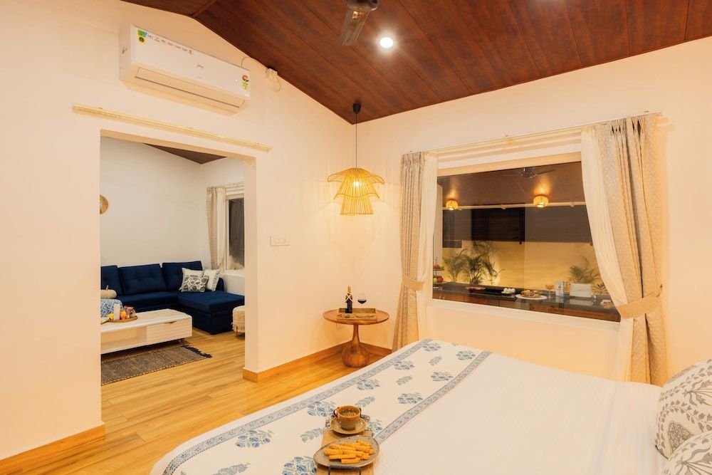 ELIVAAS House of Neptune 1 BHK Boutique Cottage, 1 King Bed, Patio, Sea View 9