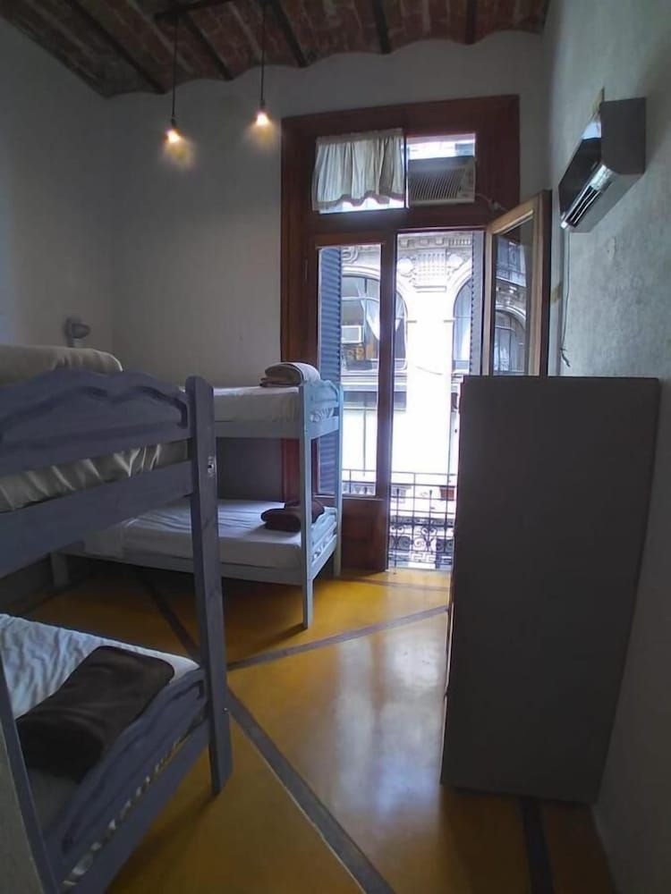 4 beds mixed dorm with bathroom and balcony
