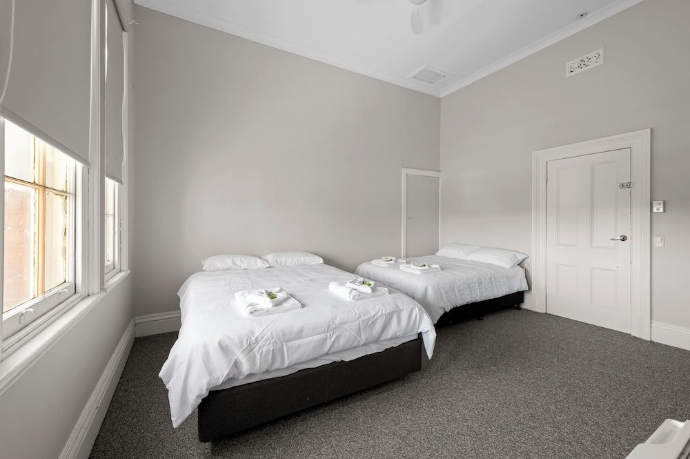 Euroa Hotel Basic Quadruple Room, Multiple Beds, Shared Bathroom 2