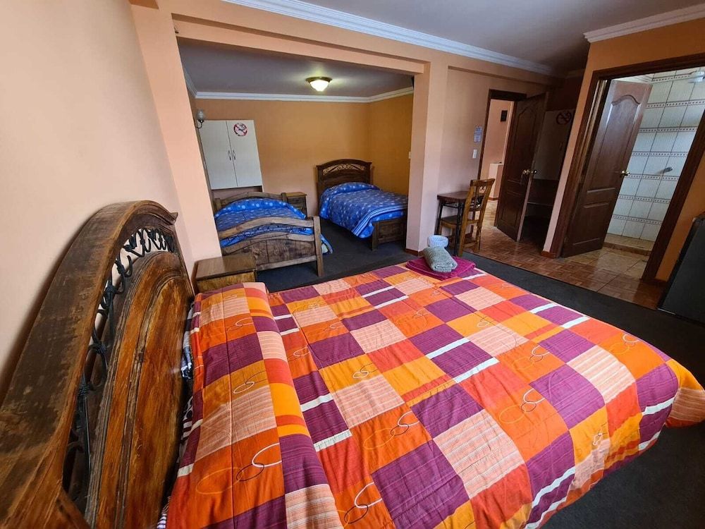 Quadruple Room (Baño Privado)