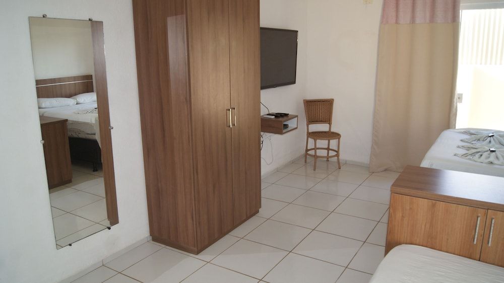 Pousada Brisa da Canoa Deluxe Triple Room 4