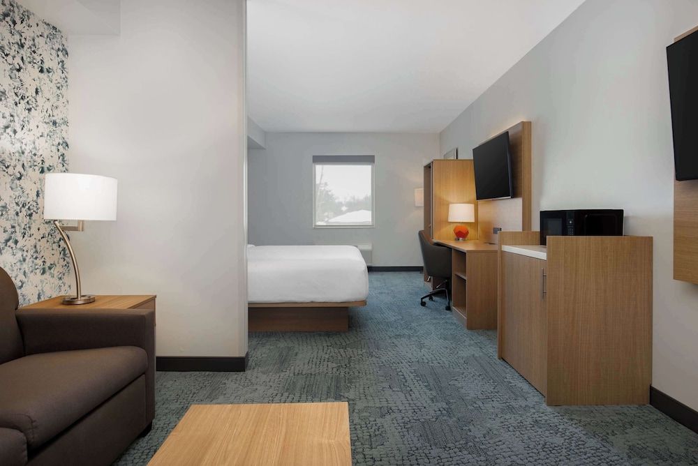 Quality Inn & Suites Suite, 1 King Bed with Sofa bed, Accessible, Non Smoking