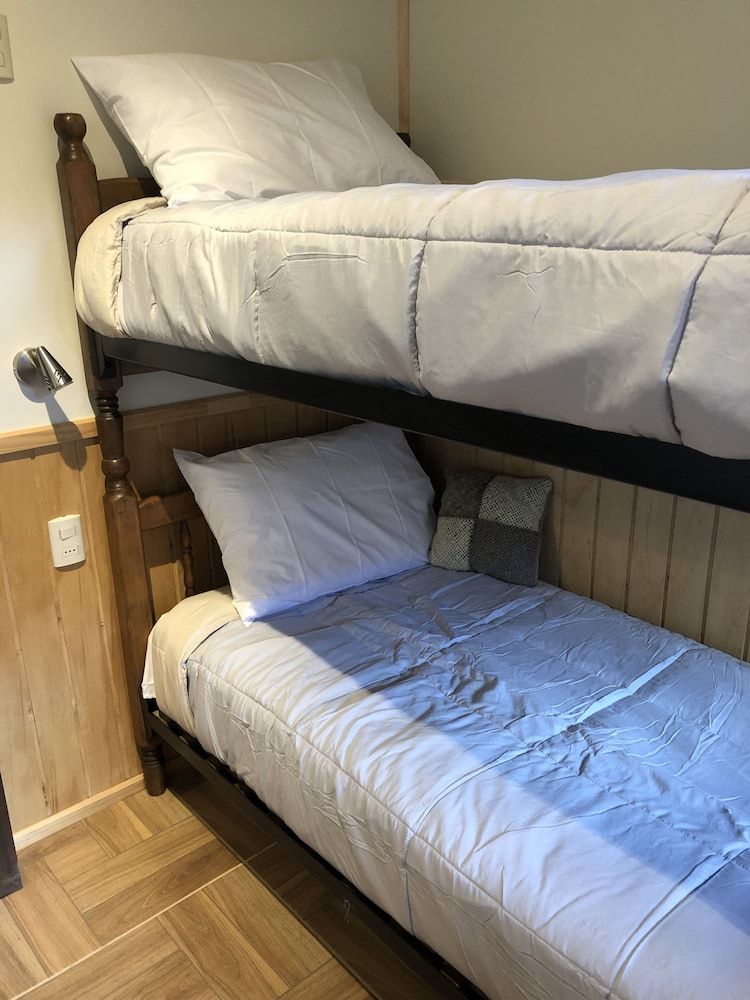 Magellanicus Rustic Suites Comfort Apartment, 2 Bedrooms, Kitchenette, Courtyard Area 4