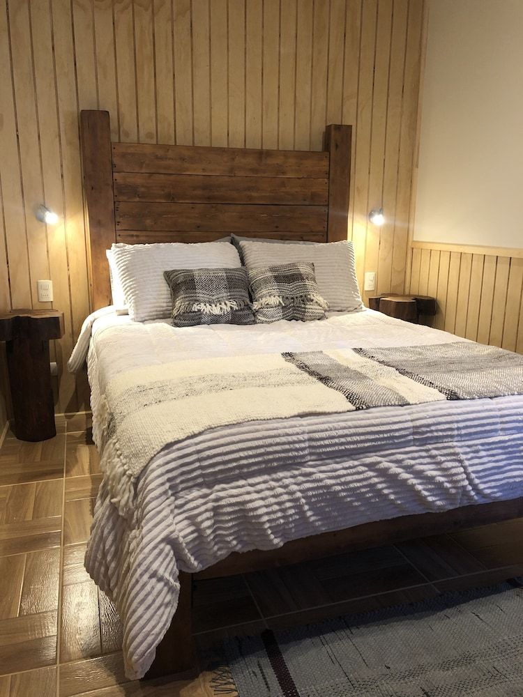 Magellanicus Rustic Suites Comfort Apartment, 2 Bedrooms, Kitchenette, Courtyard Area 3