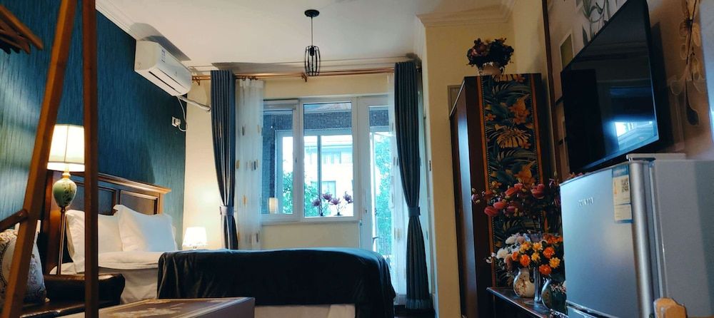 ATRIUM FENGZHU HOMESTAY Spanish Flamengo Suite Twin Beded Room 16