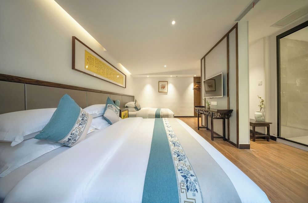 Qixin Xianting Hotel Family Suite, City View