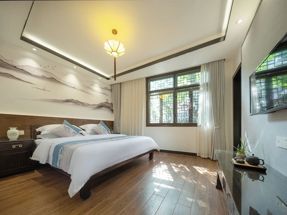 Qixin Xianting Hotel