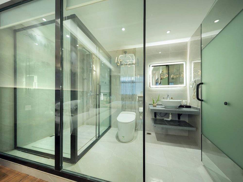 Qixin Xianting Hotel Standard Quadruple Room 4