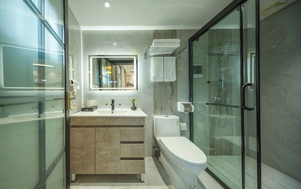 Qixin Xianting Hotel Comfort Single Room 4