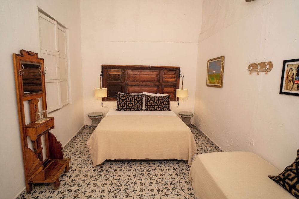 Casa Al Alma Deluxe Triple Room 9