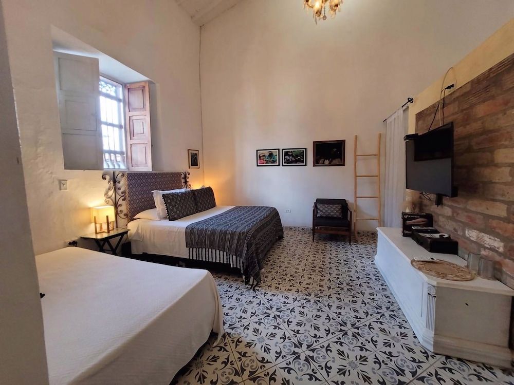 Casa Al Alma Deluxe Triple Room 4