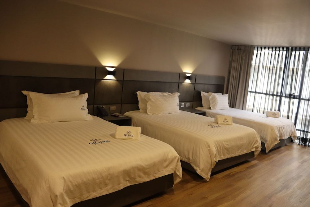 Giluxe Hotel Deluxe Triple Room 2
