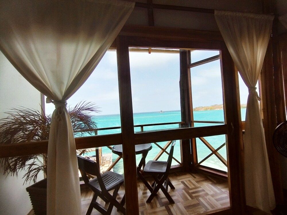 Rosario Ecohotel Quadruple Room, Balcony, Sea View 3