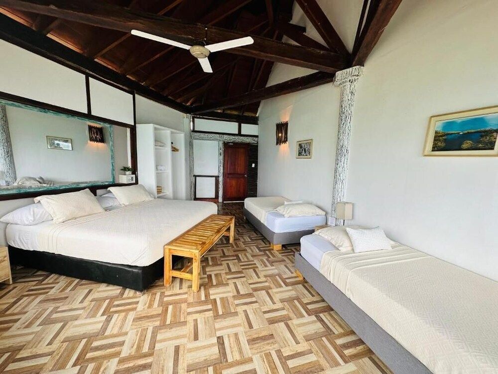 Rosario Ecohotel Quadruple Room, Balcony, Sea View