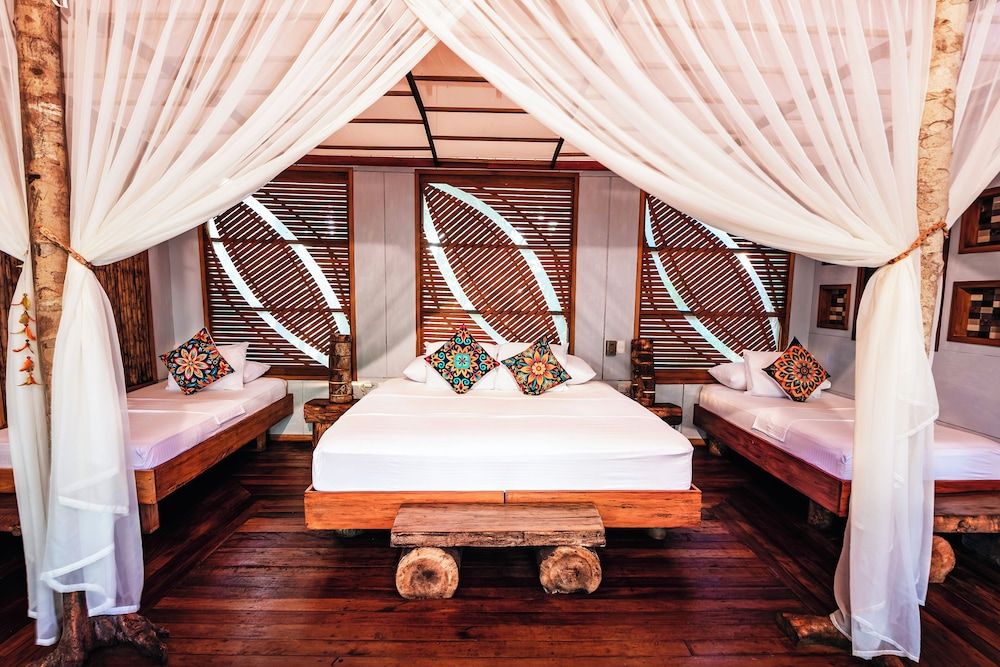 Buru Nature Hotel Premium Triple Room 2