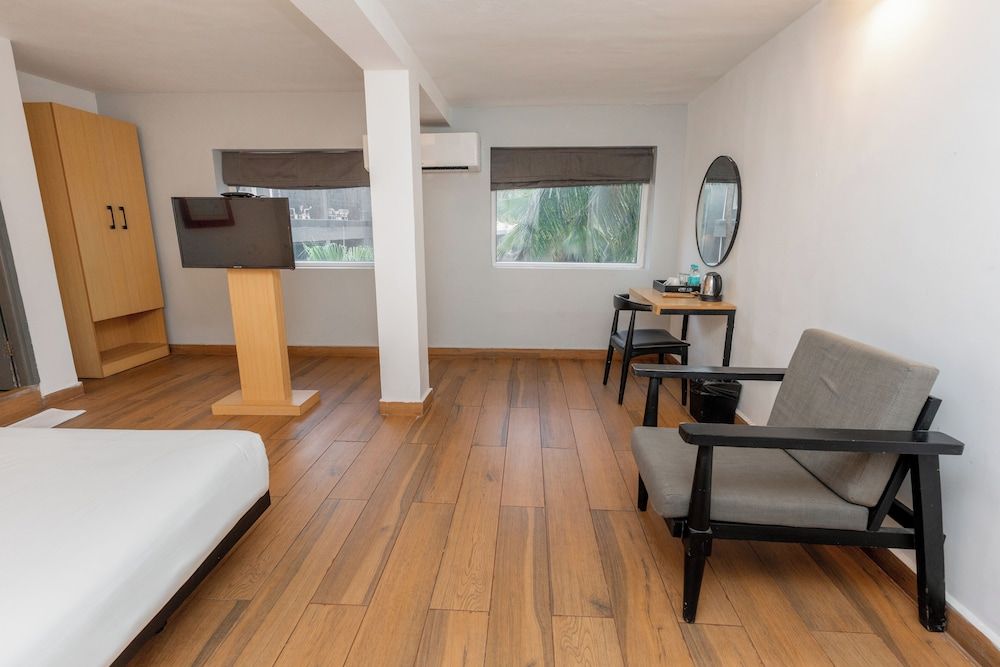 Magnum Resorts Candolim Deluxe Room 10