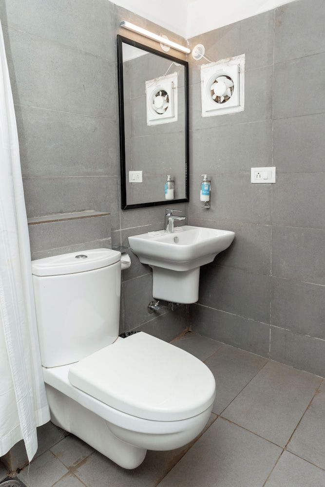 Magnum Resorts Candolim Deluxe Room 7