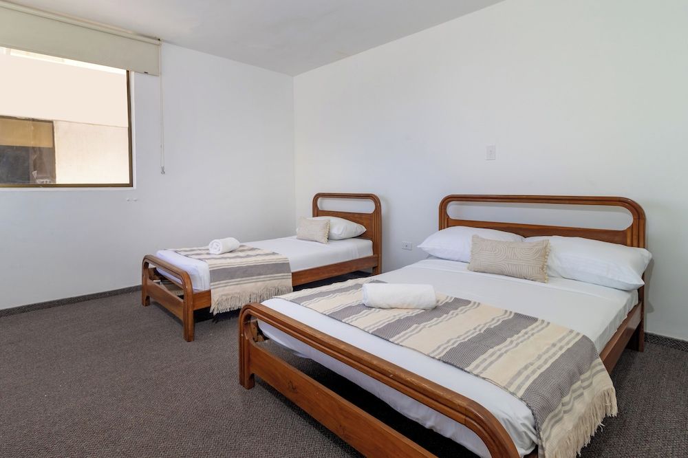 Hotel Axis Inn By GEH Suites Standard Triple Room 6