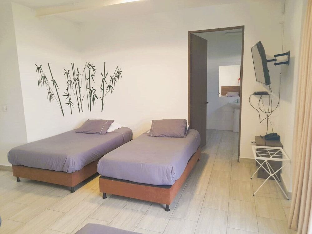 Hotel Entre Lomas Family Quadruple Room 3