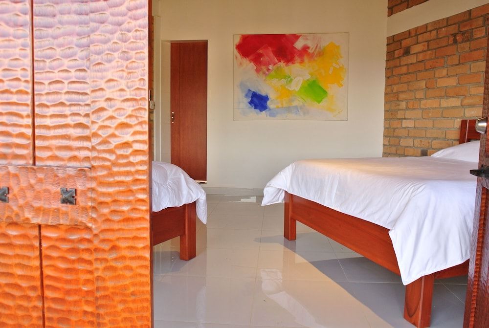 Hotel Kasama Comfort Quadruple Room, 2 Bedrooms, Garden View 2