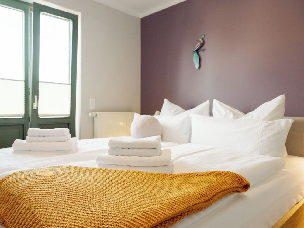 OSTKÜSTE Villa Steigel Design Apartments Deluxe apartment with 2 bedrooms, sauna, and balcony - No. 6