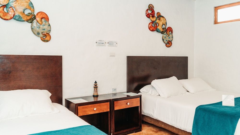 Hotel Isamar Galapagos Beachfront Deluxe Room, Garden View 8