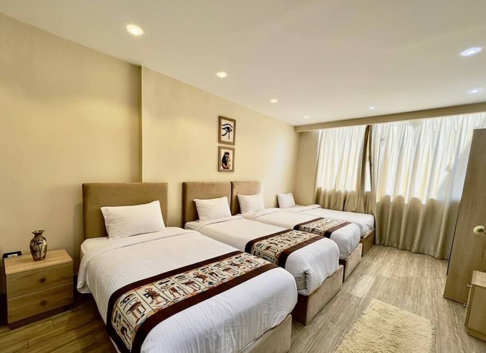 King of Pharaohs Pyramids View Premium Quadruple Room 16