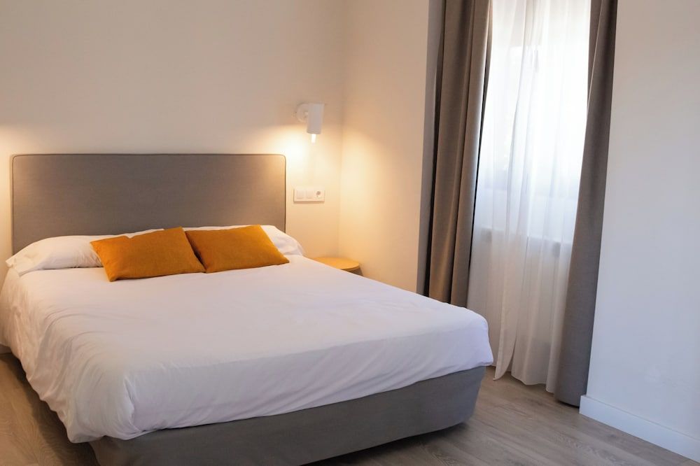 Habitación superior con balcón