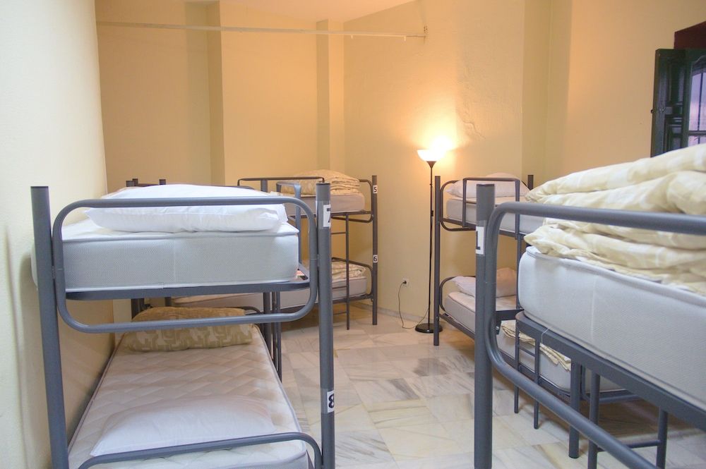 Bed in 8-bed mixed dormitory, shared bathroom