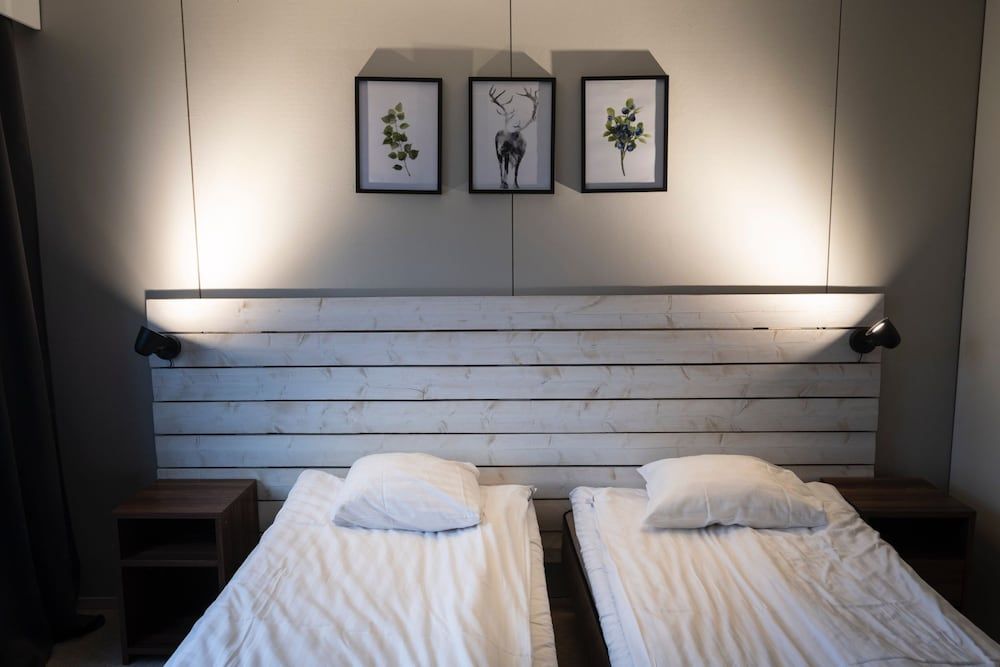 Arctic Raja Inn Basic Quadruple Room, River View 4