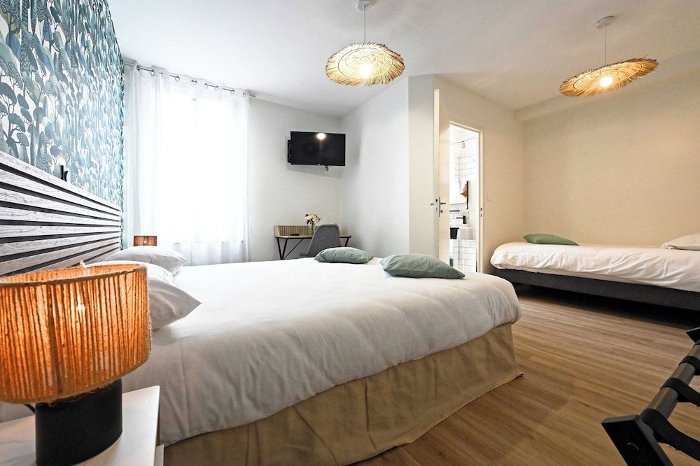 Hôtel le Terminus et son restaurant Côte à Côte Comfort Triple Room 4