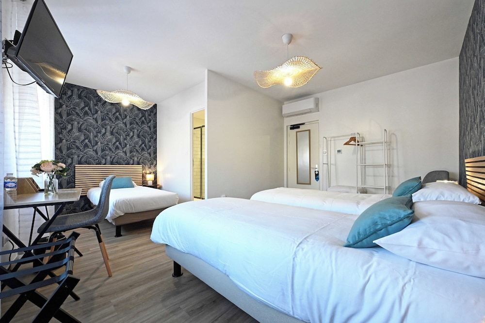 Hôtel le Terminus et son restaurant Côte à Côte Comfort Triple Room 3