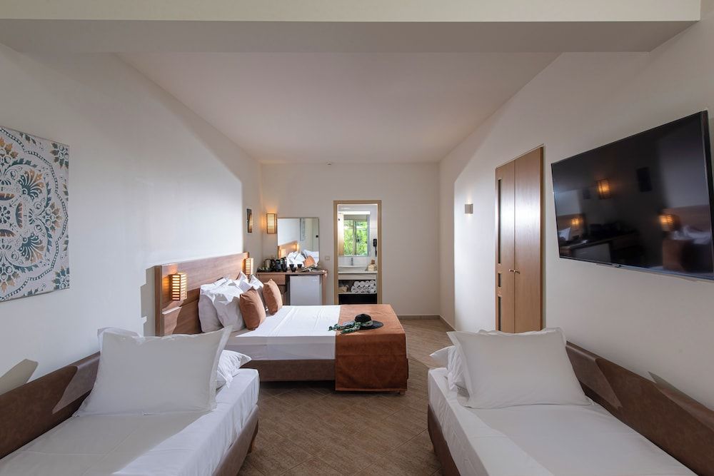 Comfort Quadruple Room, Patio, Pool View