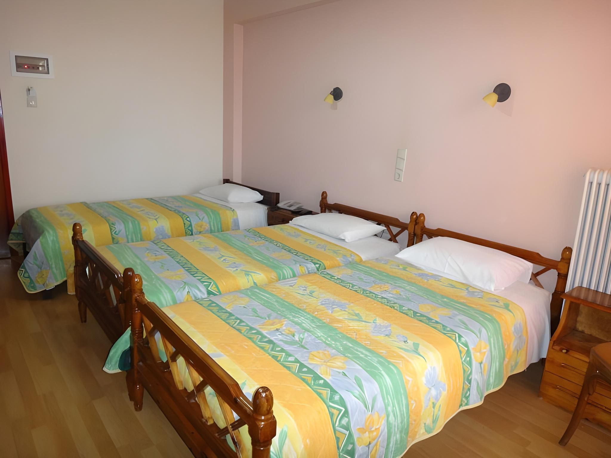 Triple - 3 Single Beds
