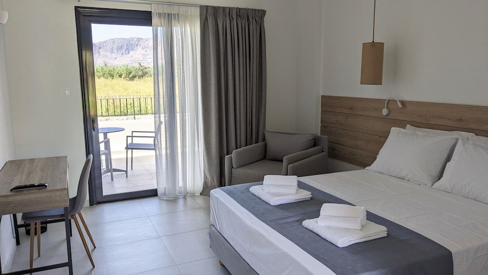 Double Room with Armchair Bed | Garden & Side Sea View