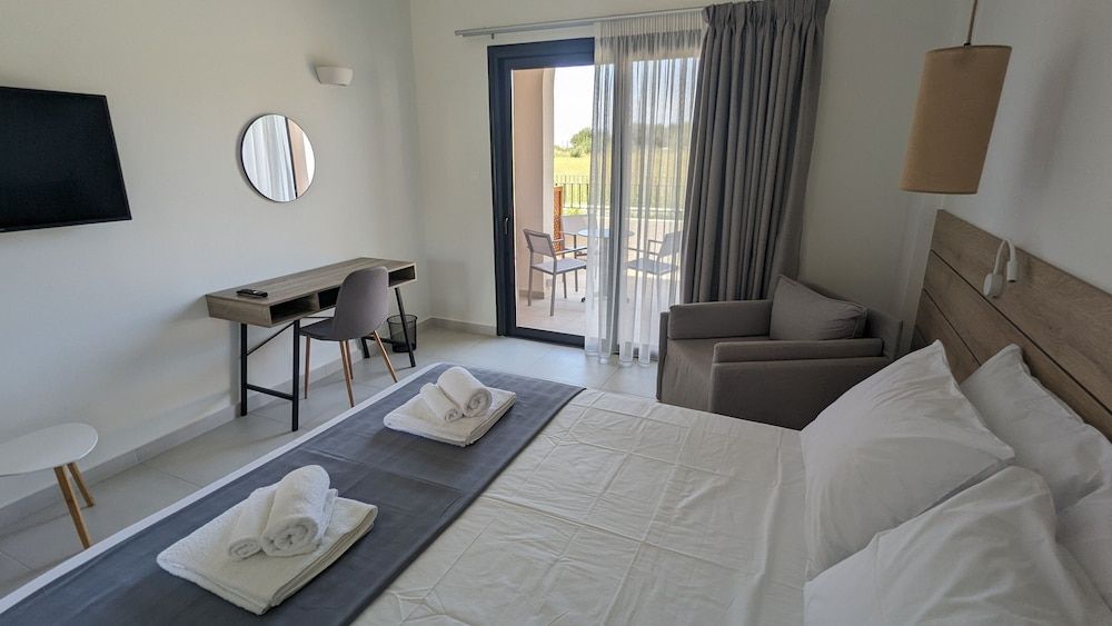 Double Room with Armchair Bed | Garden & Side Sea View