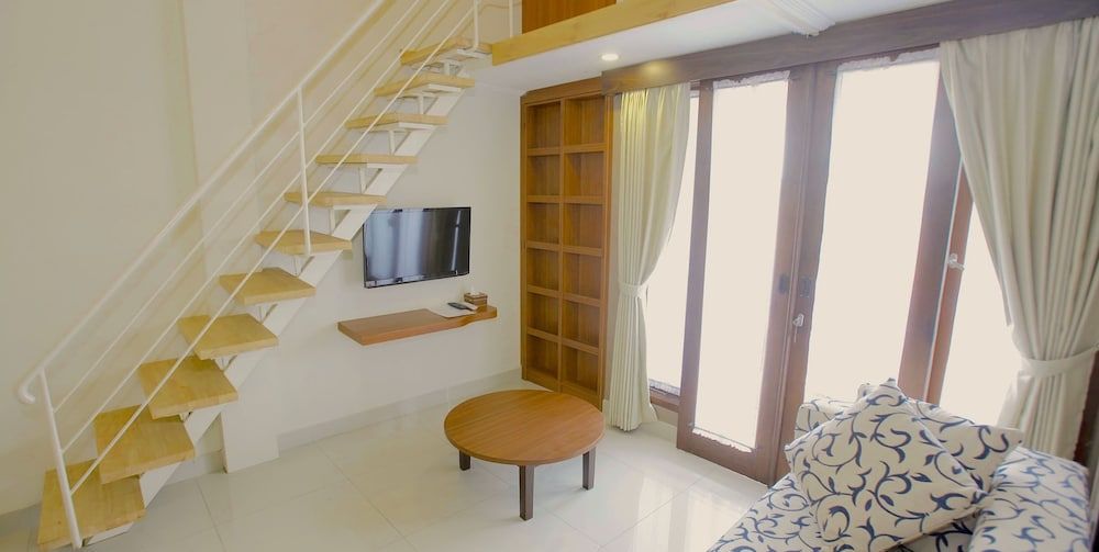 Rumah Kandjani By Makati Executive Room, Multiple Beds, Kitchenette 7