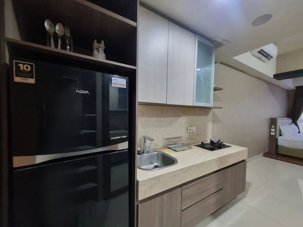 Cozy And Warm Studio Room At Uttara The Icon Apartment