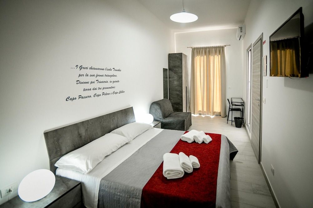 Sikania Rooms Camera 2 Quadrupla