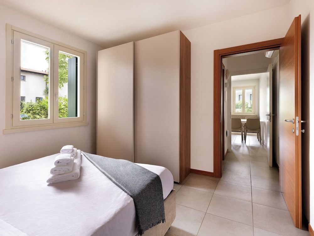 RESIDENCE FIORE ROSSO Appartamento con Giardino 2