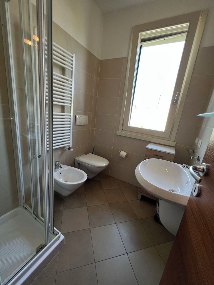 RESIDENCE FIORE ROSSO Appartamento con Giardino 3