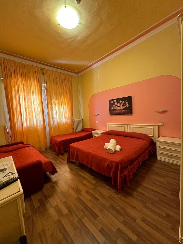 Room in Guest Room - Fly in Viareggio Beach in Front of the Famous Promenade With Shops and Establishments