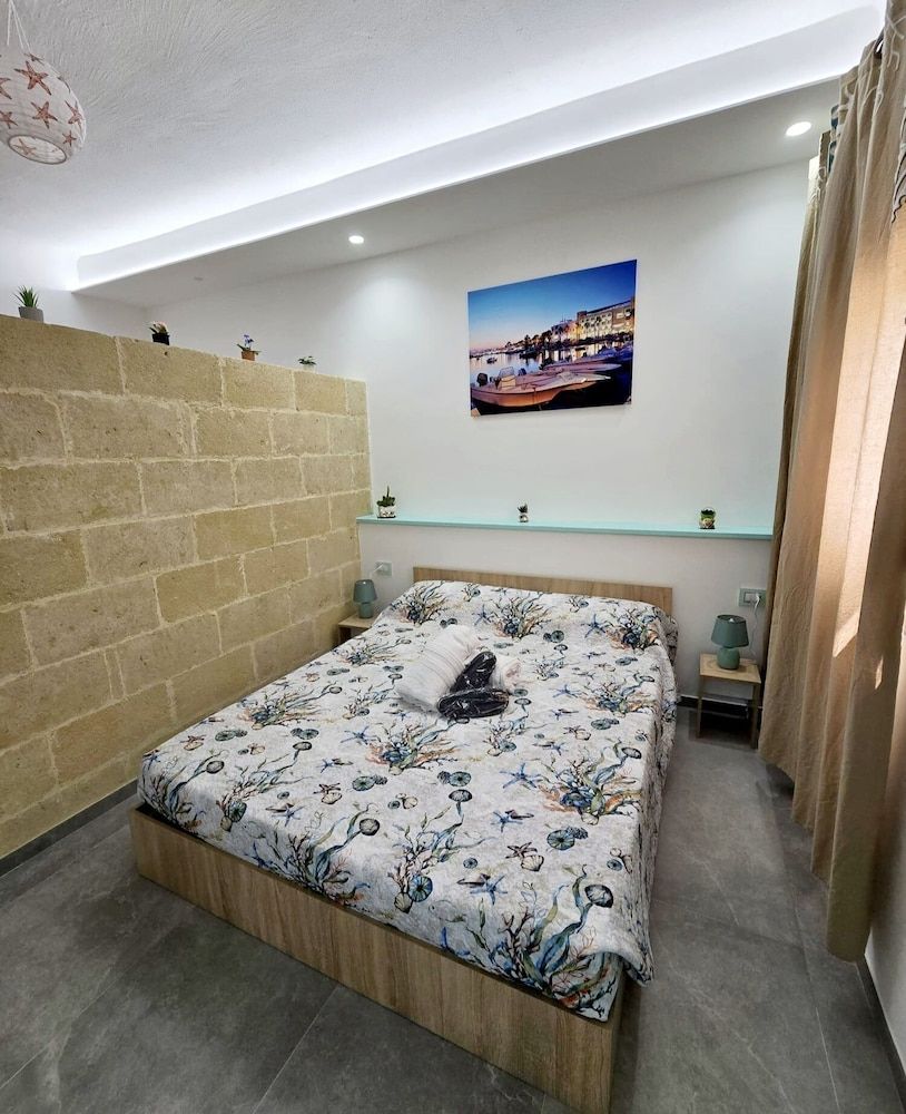 Aquamarina Rooms Deluxe Room, Courtyard View 7