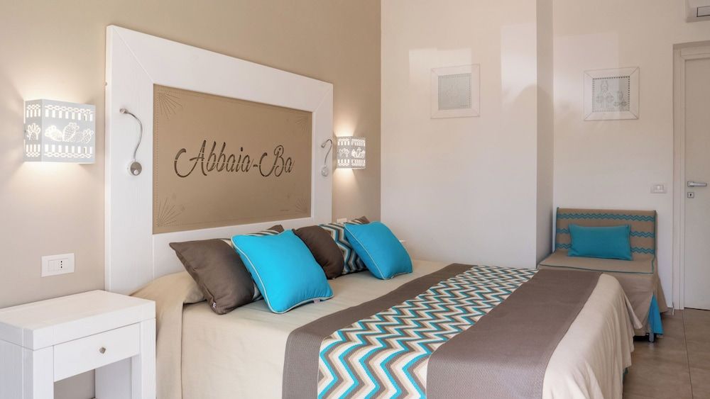 Resort Abbaia Ba Deluxe Triple Room