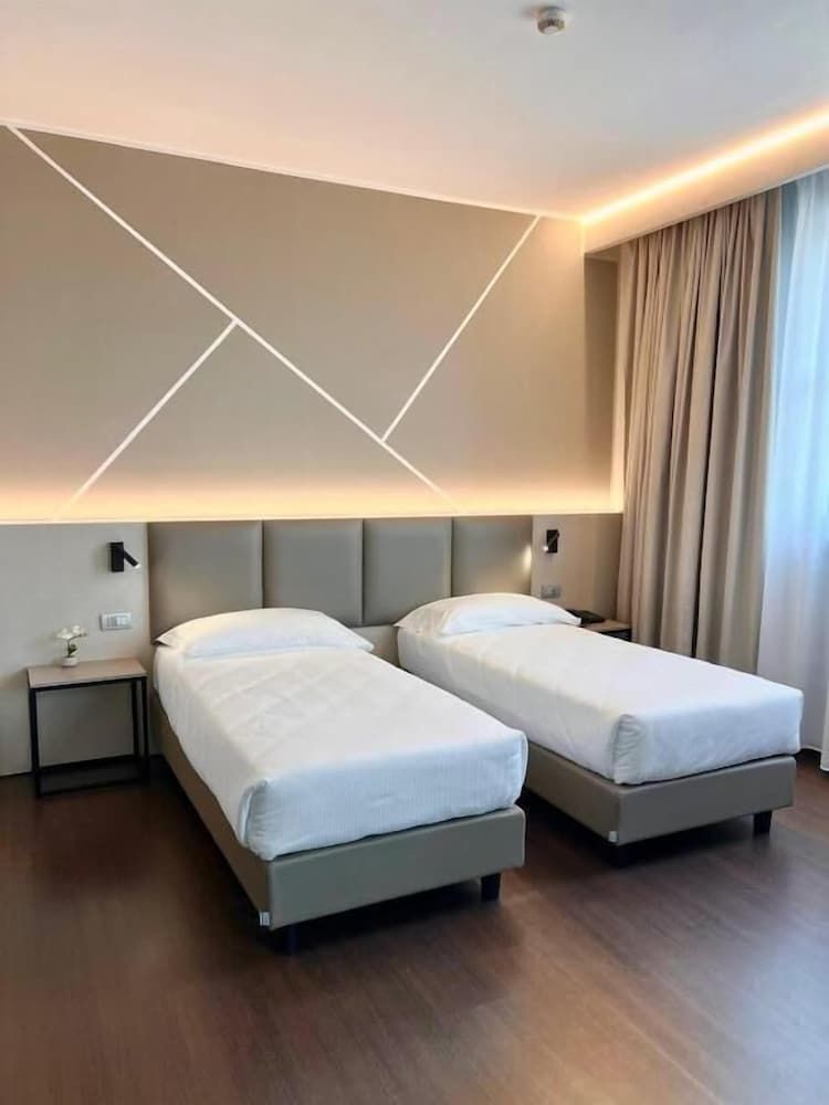 Unico Hotel Triple Room