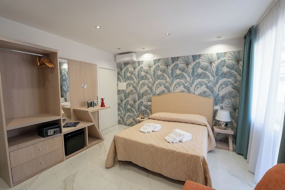 Deluxe Quadruple Room, Balcony, City View